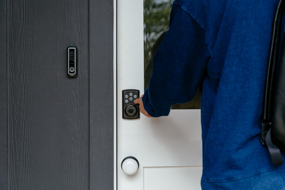 A home's front door equipped with a smart lock. 
